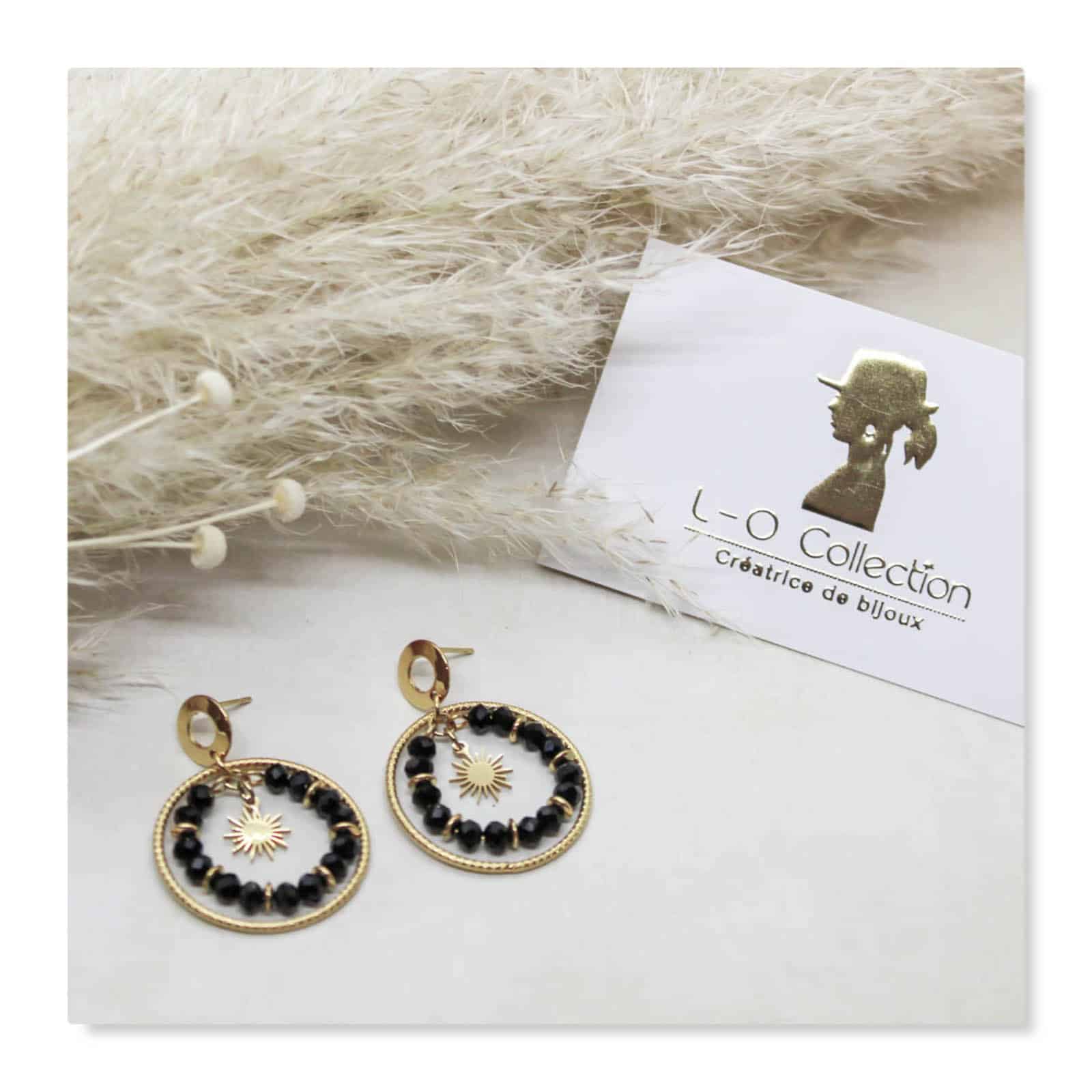 Boucles d'oreilles raffinées noir et or