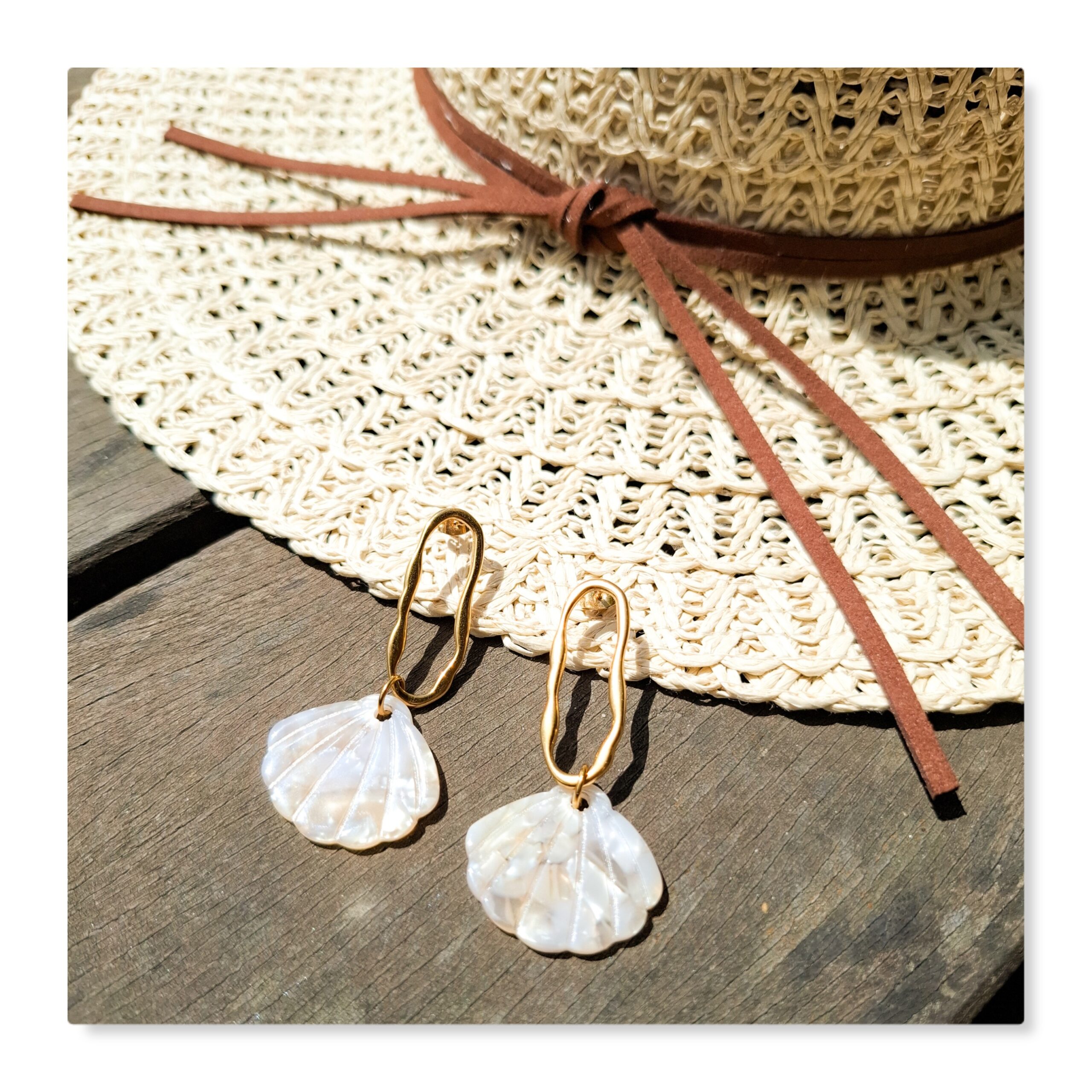 boucles d'oreilles coquille saint jacques symbolisant le chemin de compostelle en galice